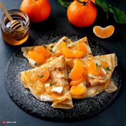 Crepas de cottage griego con mandarina